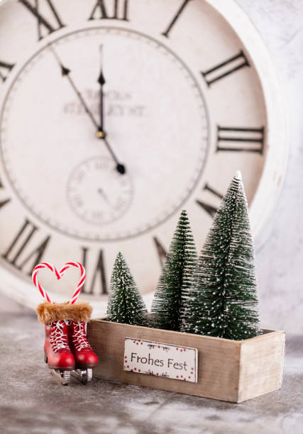 istock Christmas clock with winter decoration. Happy new year concept 1368911114