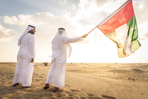 istock Arabic men in the desert 1368913424