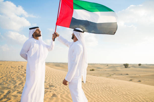 istock Arabic men in the desert 1368913504