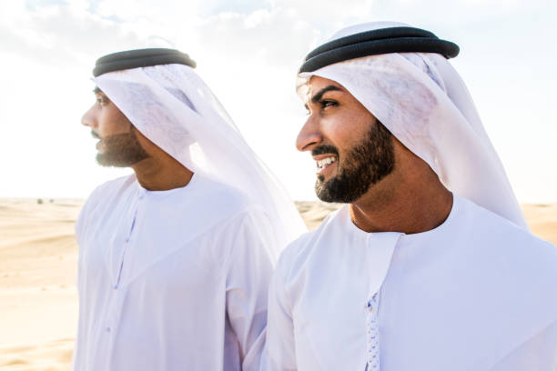 istock Arabic men in the desert 1368917632