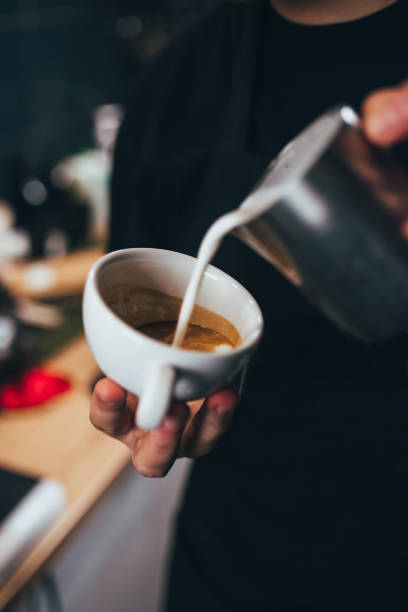 istock Barista hands during work - professional coffee brewing 1368917634