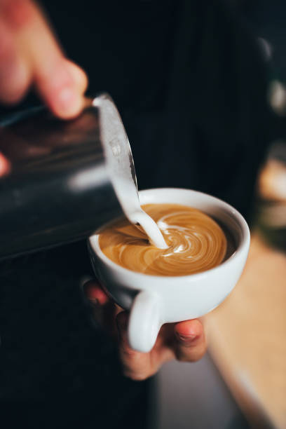 istock Barista hands during work - professional coffee brewing 1368917639