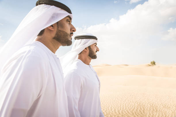 istock Arabic men in the desert 1368918183