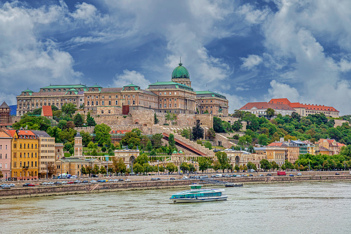 Budapest: View across the Danube River of the imposing Buda Castle, located on the historic Castle Hill.