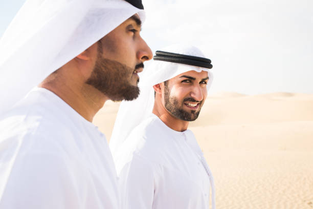istock Arabic men in the desert 1368918643