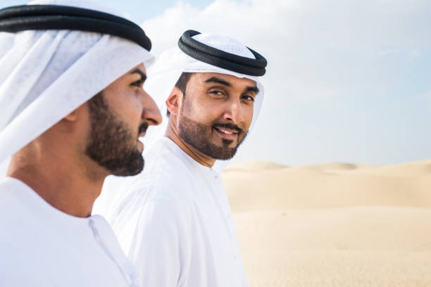 istock Arabic men in the desert 1368918684