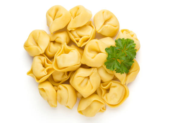 istock Raw homemade pasta,tortellini with herbs. 1368919204