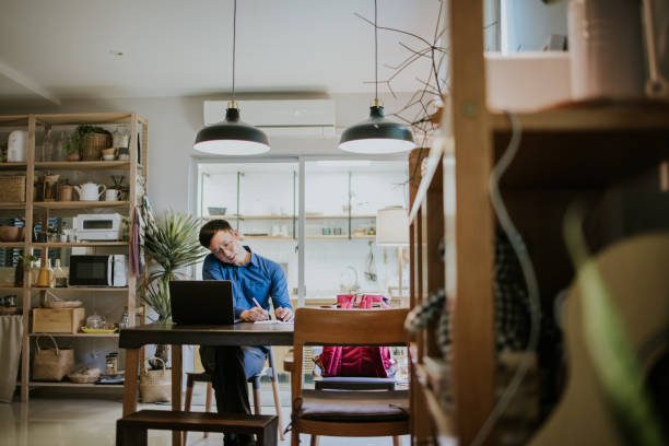istock Listening all requirment from customer and note your ideas. 1368920447