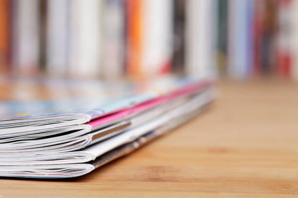 istock Stack of magazines that progressively blurs toward the right 1368920602