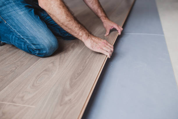 istock Laminate flooring - professional, qualified installation of laminate 1368921772