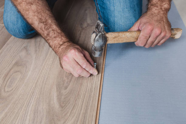 istock Do not fix the laminate to the floor with screws and nails - floating floor technology 1368921814