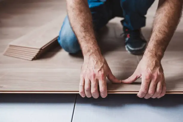 Photo of Easy and quick installation of the flooring - connecting laminate locks