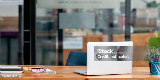 Laptop Mock Up Decor And Copy Space On Minimal Wooden Working Desk Stock Photo - Download Image Now