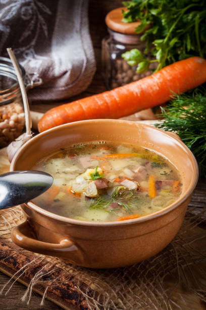 istock Pea soup with vegetables and bacon. 1368932373