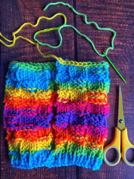 istock Sewing up a piece of hand knitting 1368933137