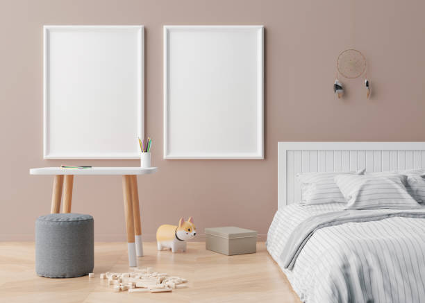 istock Two empty vertical picture frames on brown wall in modern child room. Mock up interior in scandinavian style. Free, copy space for your picture. Table, bed, toys. Cozy room for kids. 3D rendering. 1368933642