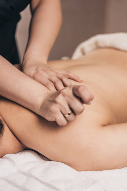 istock Therapeutic wellness back massage for scoliosis 1368933723