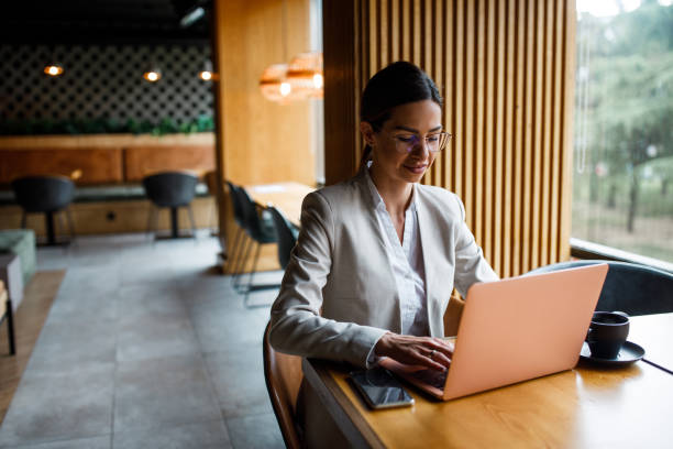 istock Successful woman working on a laptop 1368934925