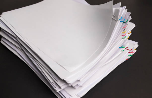 istock Top view Stack of Group report papers Document clipped in color clips 1368935016