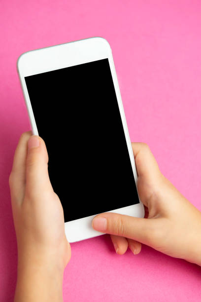 istock Little Girl Using Mobile Phone 1368935088
