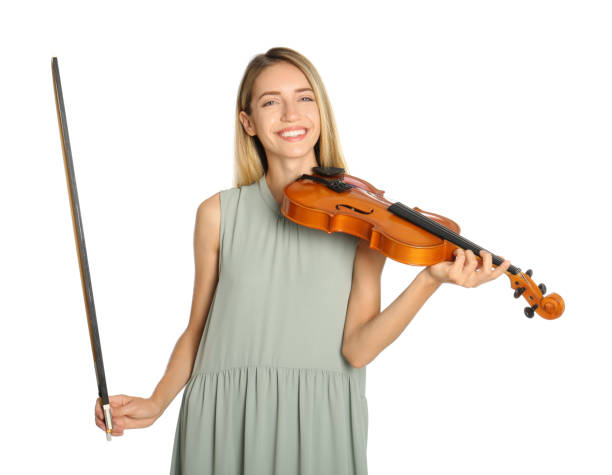 istock Beautiful woman with violin on white background 1368935149