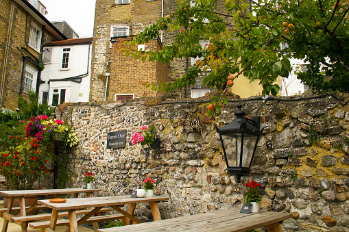 A cozy and memorable English pub. The famous venue for the cross Channel swimmers. A nice place to have traditional food and drink al fresco. Castle Hill Road, Dover, UK, the English Channel, summer.