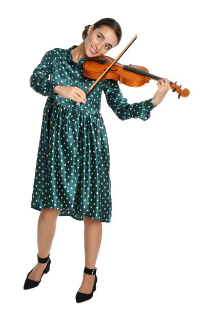 istock Beautiful woman playing violin on white background 1368936324