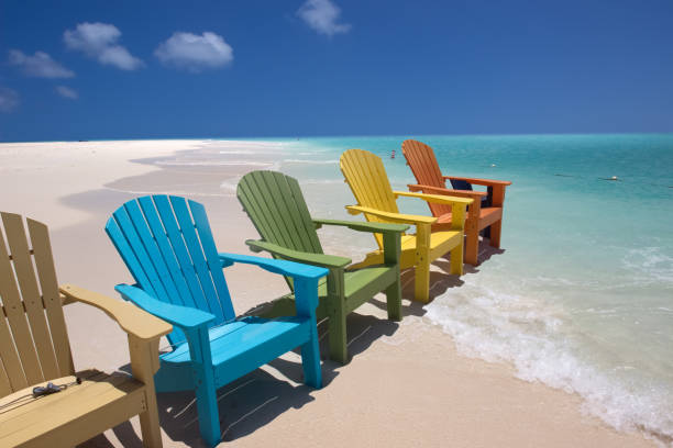 istock Colorful beach chairs on caribbean coast 1368936717