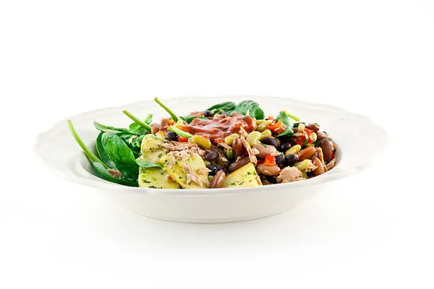 Delicious tuna three bean salad with red pepper dressing on white