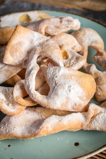 istock Faworki decorated with powdered sugar. 1368938804