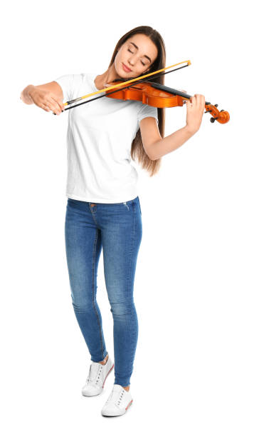 istock Beautiful woman playing violin on white background 1368938835
