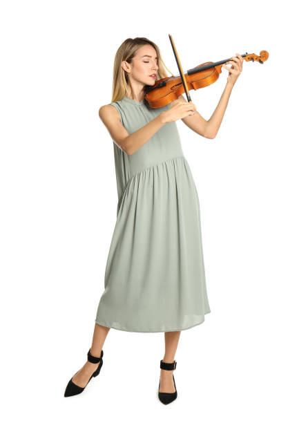 istock Beautiful woman playing violin on white background 1368939731