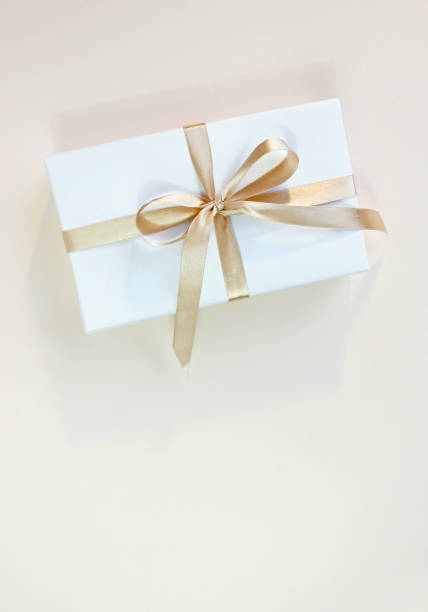istock gift box. free space for text on pastel background. Valentines day concept. Mother's Day concept. Greetings. Copy space. Flat lay, top view. 1368941366