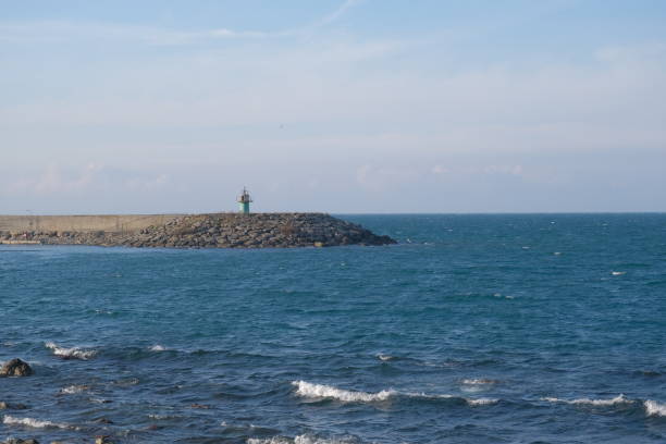 istock Lighthouse and port in black sea, 1368944576