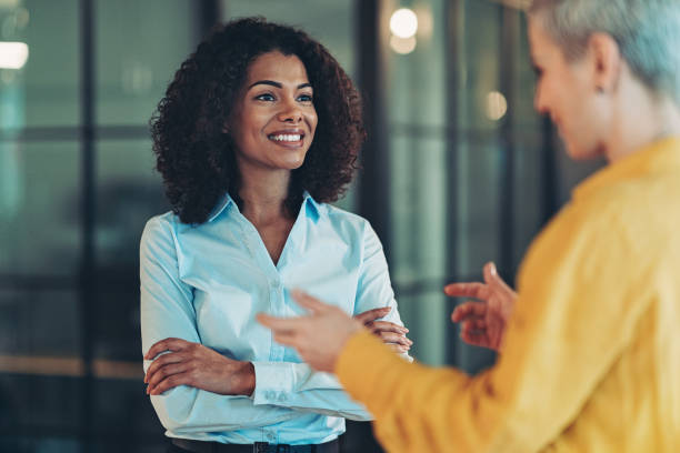 istock Smiling black businesswoman during a meeting 1368948608