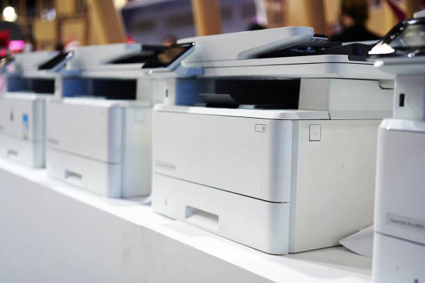 Printer and scanner Compact printer and scanner in office flat bed scanner stock pictures, royalty-free photos & images