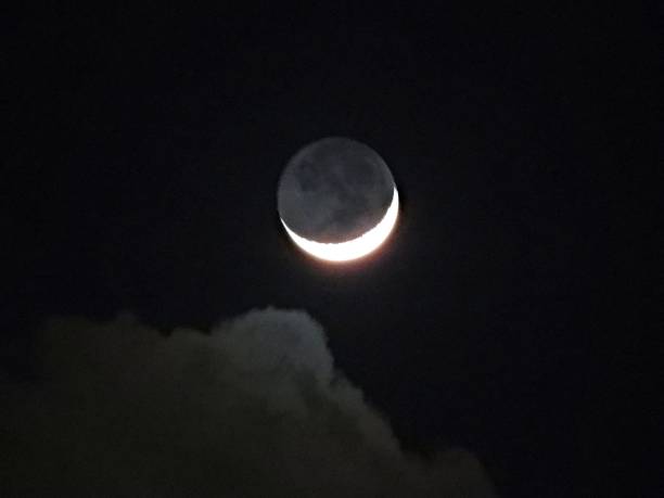 istock Waxing Crescent - February 3, 2022 with cloud 1368952589