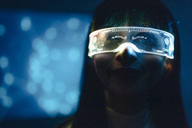 istock Young woman is using futuristic glasses with technology on background 1368953700