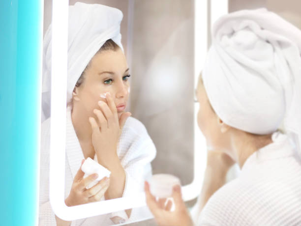 istock Magic anti-aging cream.Applying the cream. 1368957086