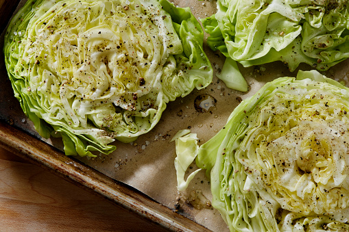 Preparing Cabbage Steaks with Olive Oil, Salt and Pepper
