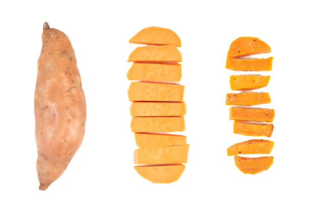 istock Whole, peeled and baked sweet potatoes on white 1368962108