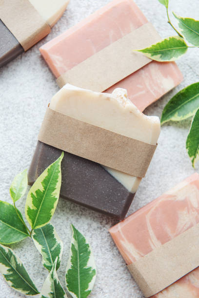 istock Handmade soap bars and green leaves 1368962318