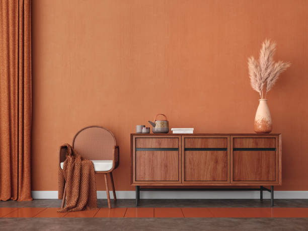 Orange room with chair,table,pampas and orange wall background.3d rendering stock photo