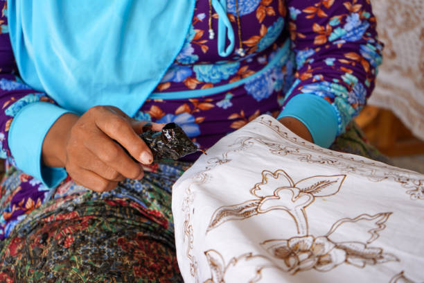 istock The technique of making batik by writing using a canting tool. Canting consists of nyamplung, cucuk, gagang or handles made of copper, bamboo and wax. Cecek, loron, telon, prapat, telon, liman, byok. 1368966809