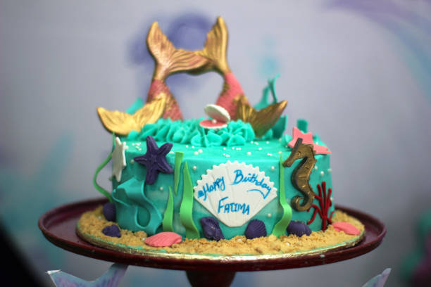Mermaid theme designer fondant birthday cake. side view. Closeup shot.