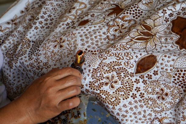 istock The technique of making batik by writing using a canting tool. Canting consists of nyamplung, cucuk, gagang or handles made of copper, bamboo and wax. Cecek, loron, telon, prapat, telon, liman, byok. 1368967244