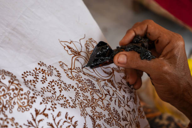 istock The technique of making batik by writing using a canting tool. Canting consists of nyamplung, cucuk, gagang or handles made of copper, bamboo and wax. Cecek, loron, telon, prapat, telon, liman, byok. 1368968231