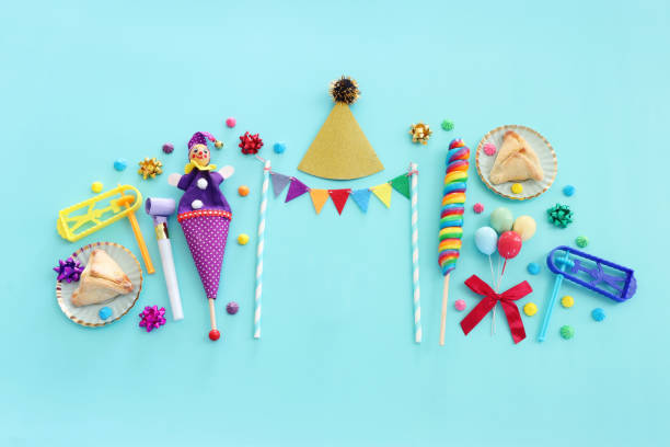 istock Purim celebration concept (jewish carnival holiday) over blue wooden background 1368969975