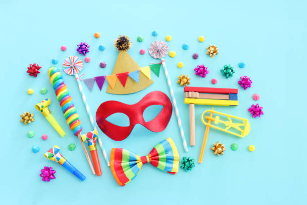 istock Purim celebration concept (jewish carnival holiday) over blue wooden background 1368969986