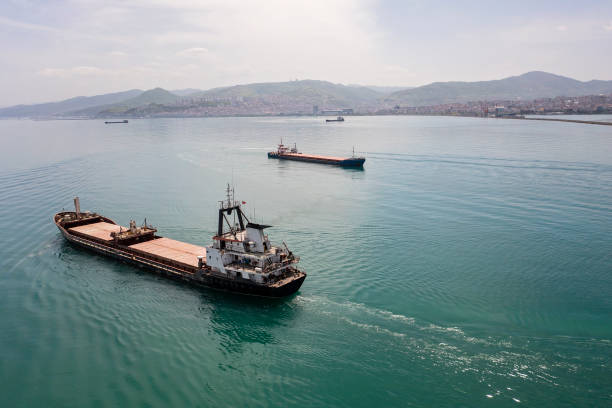 Aerial view of cargo ship in transit. Aerial view of cargo ship in transit. black sea stock pictures, royalty-free photos & images